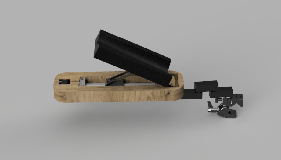 le prototype a une base en bois et un élément noir qui peut se lever