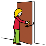 a standing person opens a door towards them