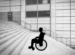 Illustration of a person in a wheelchair in front of stairs.